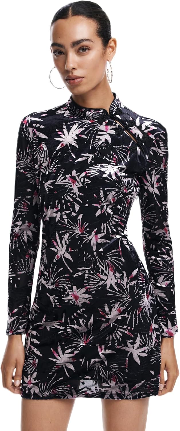 Pavo Monitor Arm installed on a wooden desk with adjustable height