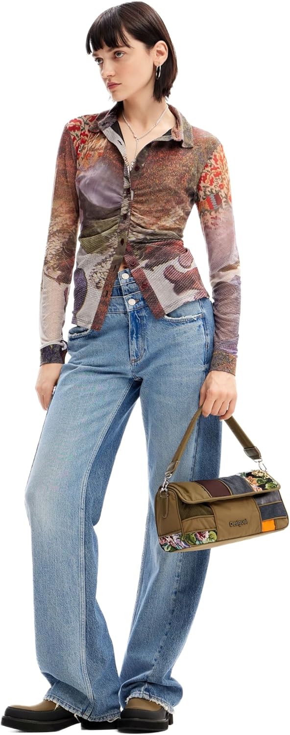 Pavo Monitor Arm installed on a wooden desk with cables organized